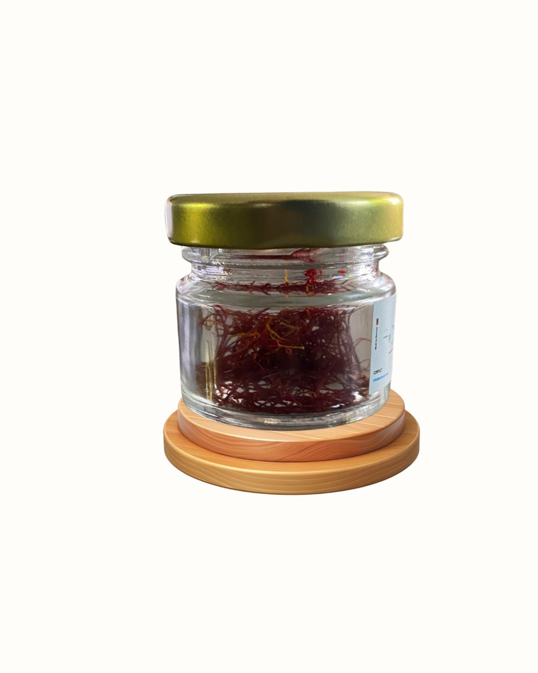 Glass jar with gold lid and wooden base on a white background